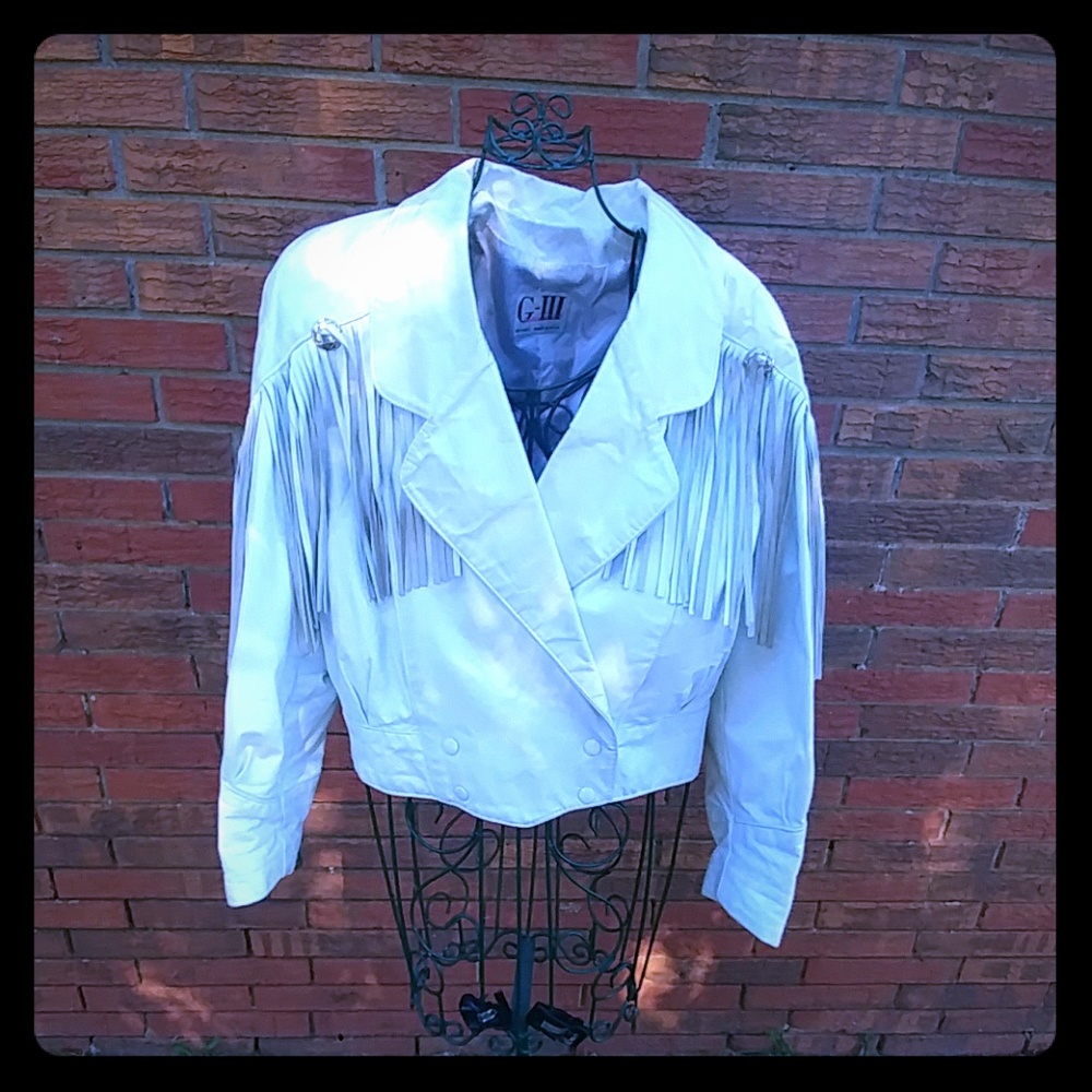 Double breasted fringed leather jacket